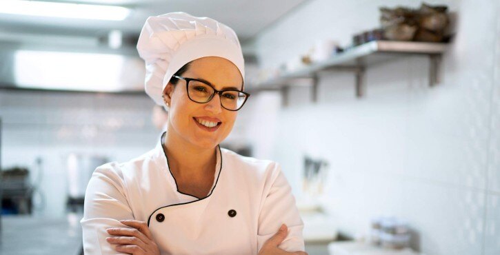 portrait-female-chef-kitchen-gettyimages-1192074857-315696-fix725x370